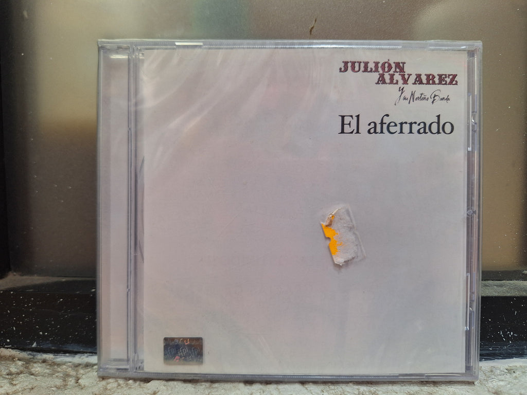 JULION ALVAREZ EL AFERRADO CD ORIGINAL NUEVO SELLADO [NACIONAL]